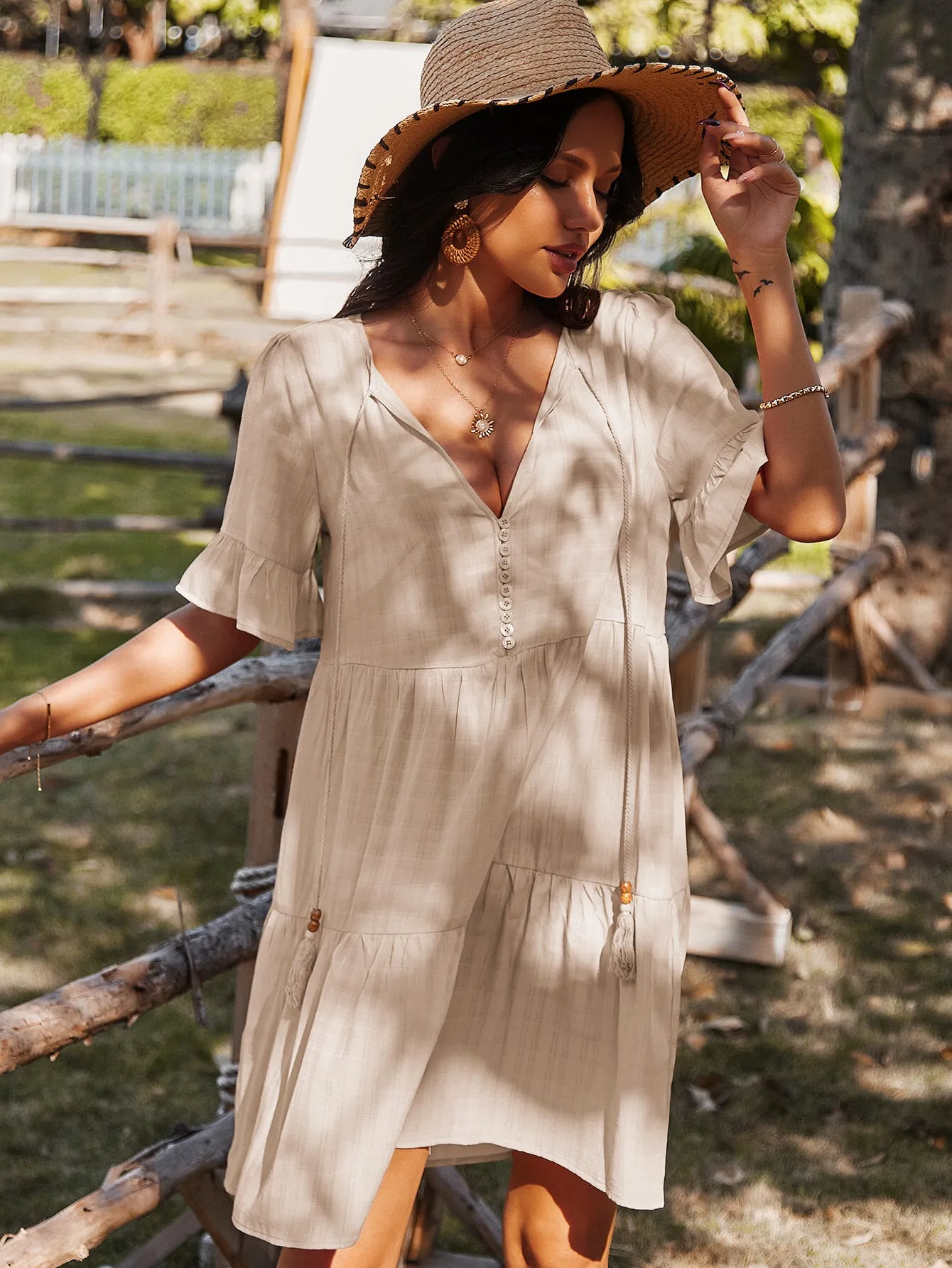 Bohemia Pure Color Knotted Button V-neck Half Sleeve Tassel Women Midi Dress